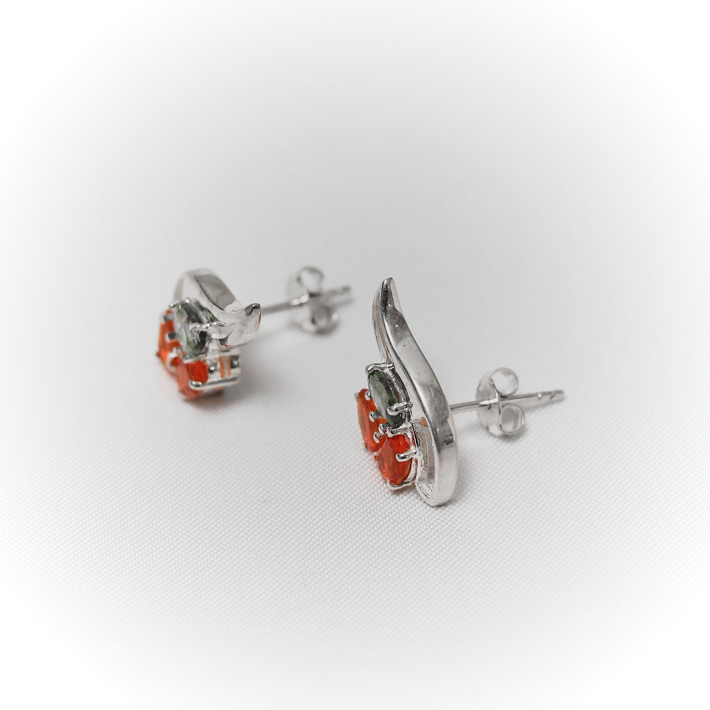 Phoenix Flame: Exclusive Garnet & Peridot Winged Stud Earrings