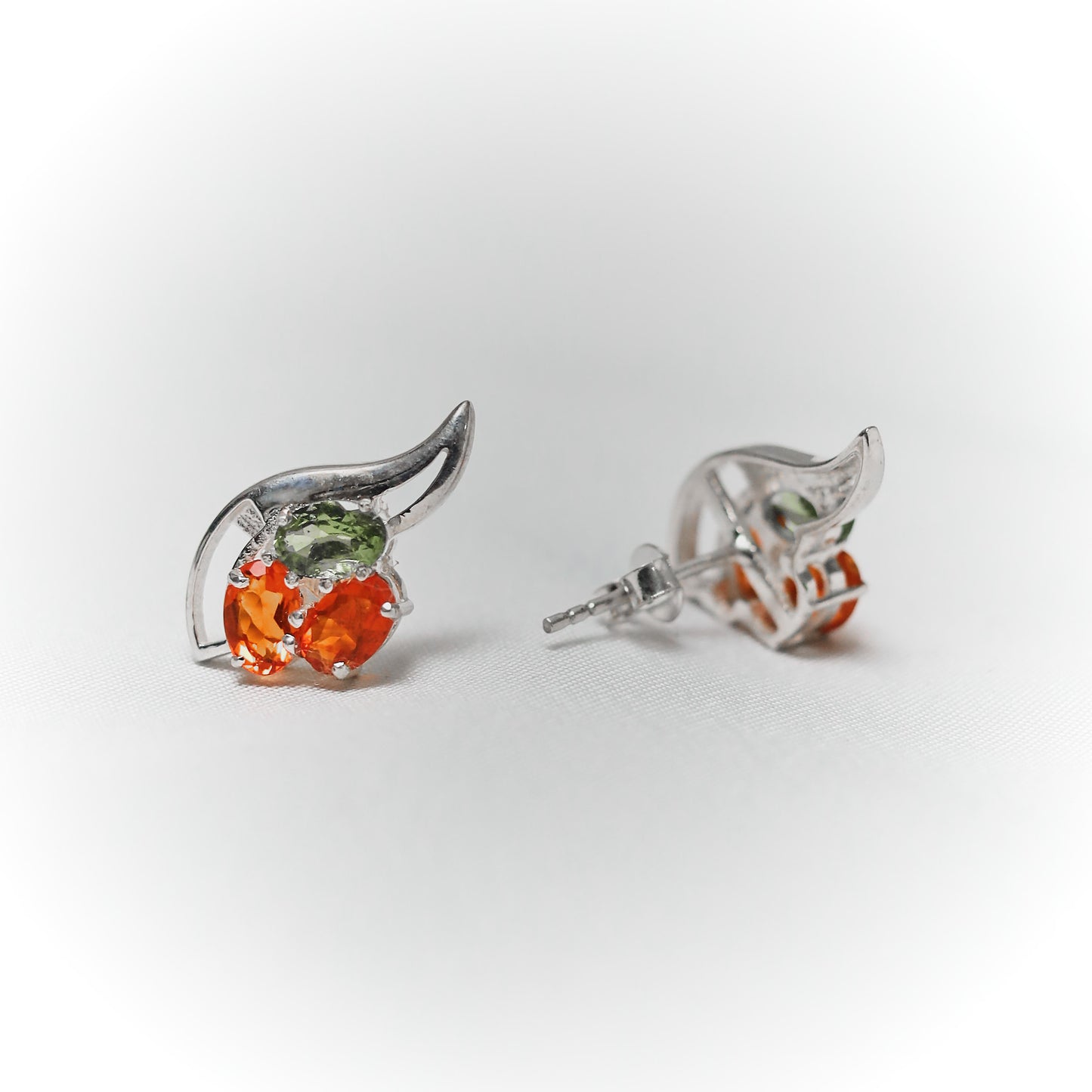 Phoenix Flame: Exclusive Garnet & Peridot Winged Stud Earrings