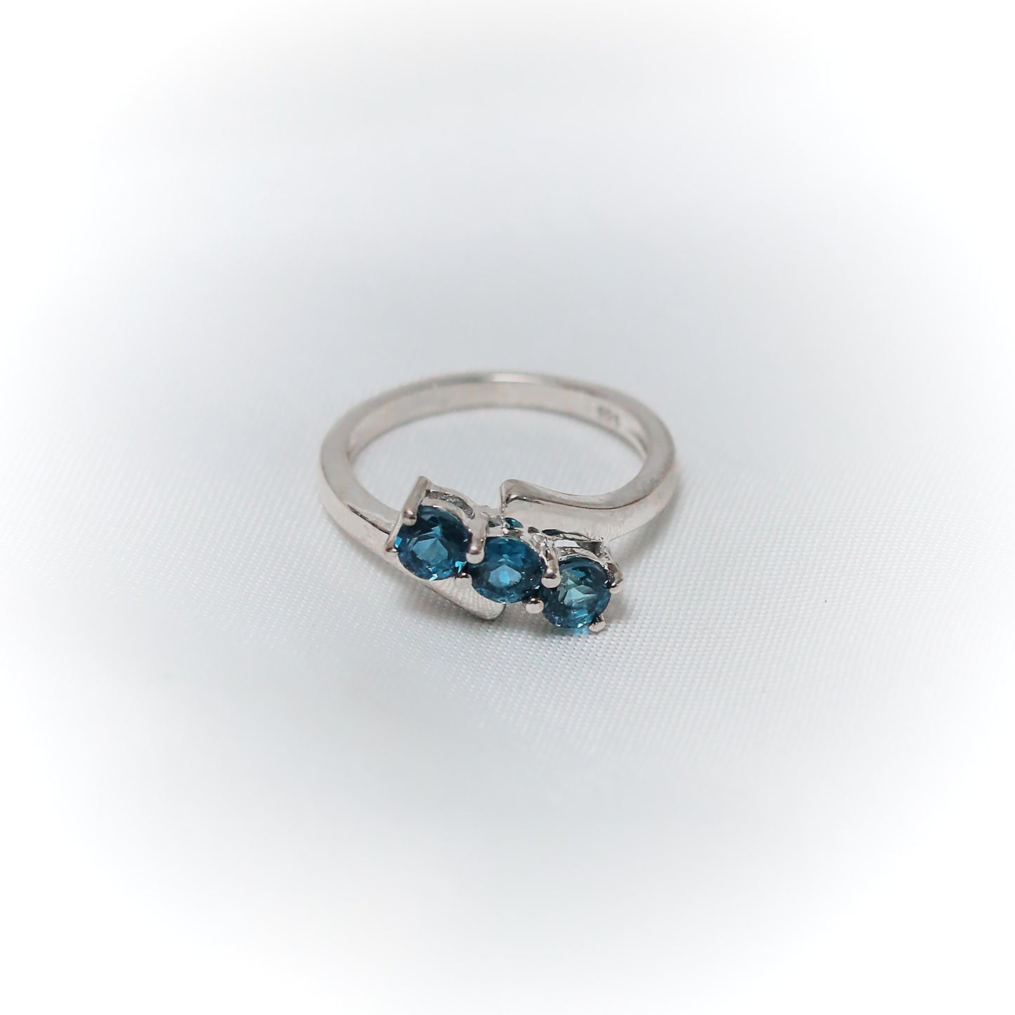 Equilibrium – Asymmetrical Blue Topaz Liberation Ring