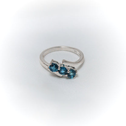 Equilibrium – Asymmetrical Blue Topaz Liberation Ring