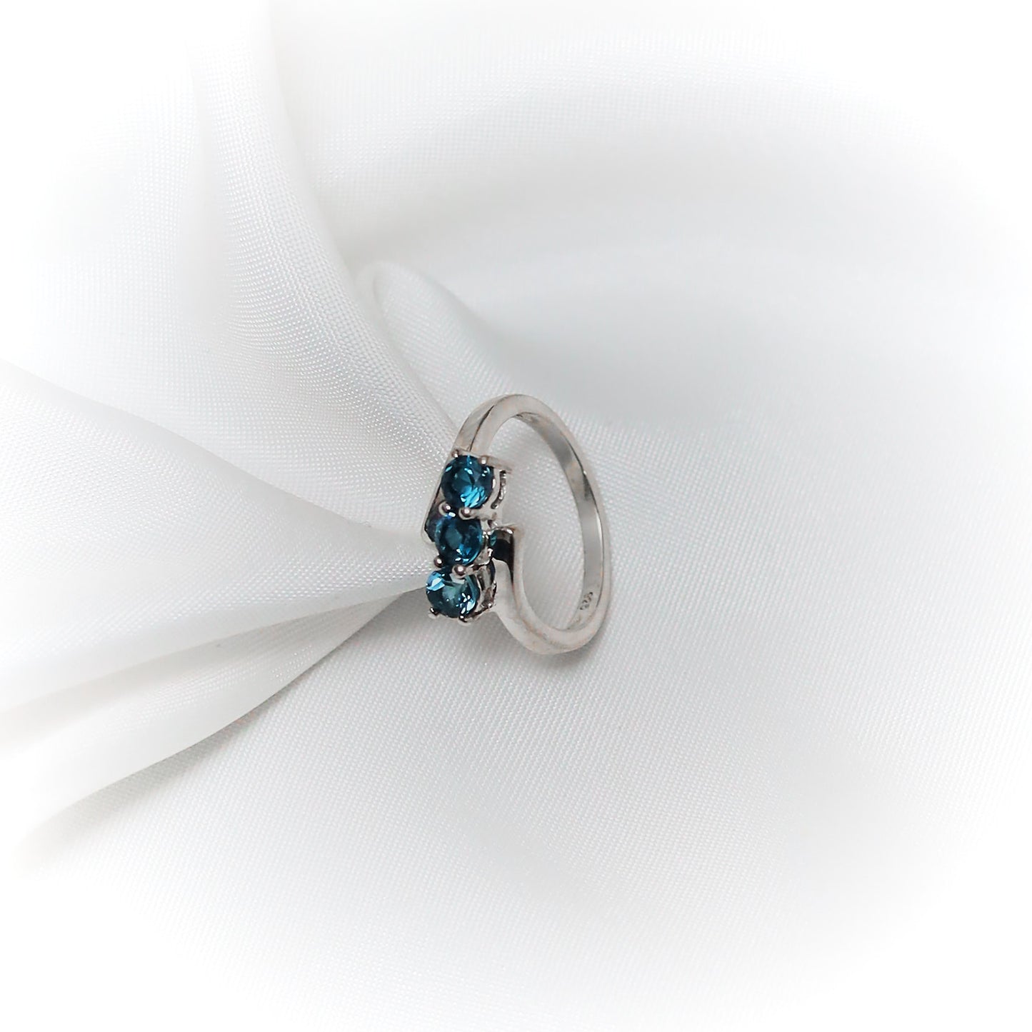 Equilibrium – Asymmetrical Blue Topaz Liberation Ring