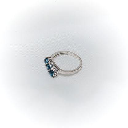Equilibrium – Asymmetrical Blue Topaz Liberation Ring